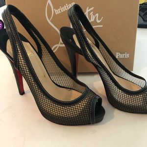 Christian Louboutin black platform, slingback net heels.